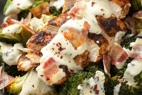 Baked chicken, broccoli with creamy cheese sauce and bacon