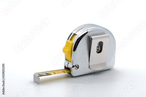 Tape measure for measuring, white background, cropped image photo