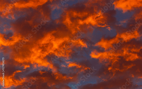 Birght skies; beautiful skies in the evening; fire background with clouds; fire in the sky; Autumn days; Autumn tone and textures; autumn colours; sky during autumn; Sunlit golden light in the evening