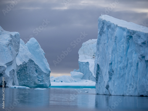 Awe-inspiring icy landscapes at the mouth of the Icefjord glacier (Sermeq Kujalleq), one of the fastest and most active glaciers in the world. Disko Bay, Ilulissat, Greenland 