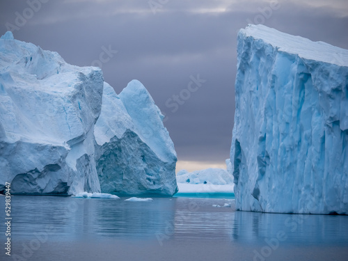 Awe-inspiring icy landscapes at the mouth of the Icefjord glacier (Sermeq Kujalleq), one of the fastest and most active glaciers in the world. Disko Bay, Ilulissat, Greenland 