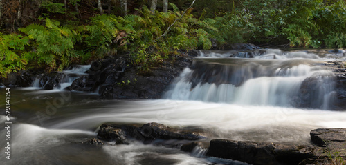 Fototapeta Naklejka Na Ścianę i Meble -  Stream in Maine running over large boulders