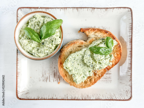Billede på lærred Greek appetizer paste spread on toast bread on plate
