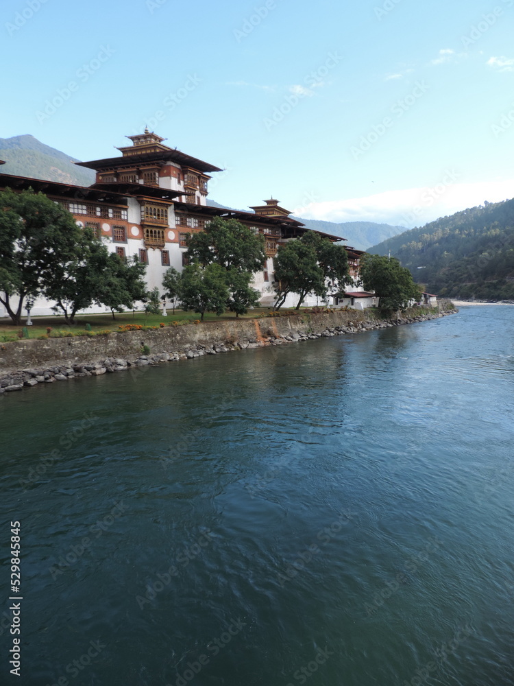 Historical architecture by the waters in Bhutan