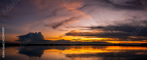 twilight Beauty Evening colorful clouds - sunlight with dramatic sky.Dramatic sky reflection in water. © noon@photo