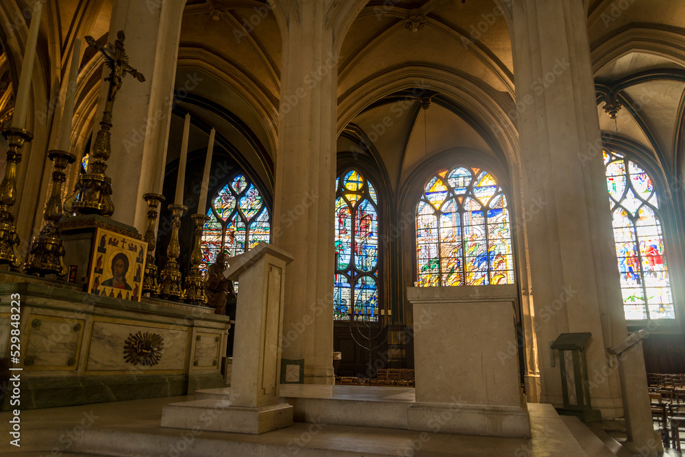 Modern stained glass window in the Church Saint-Gervais, a Gothic church on ancient worship site, begun in 1494 & home to renowned French musical dynasty, the Couperin family, Paris, France