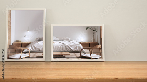 Minimalist mirrors on wooden table, desk or shelf reflecting interior design scene. Japandi bedroom with white double bed, tatami mats. Contemporary background with copy space