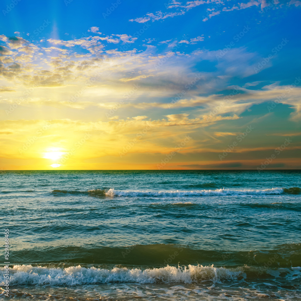 Fototapeta premium Beautiful sun set over the beach .