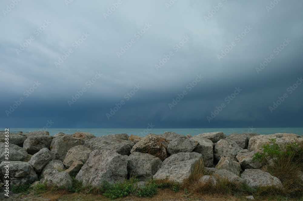 The beginning of a thunderstorm. Mediterranean Sea. Saintes-Maries-de-la-Mer, Camargue, France.
