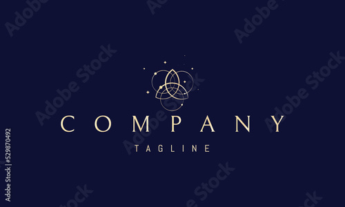 Vector golden logo on which an abstract image of a trinity symbol made up of orbits.