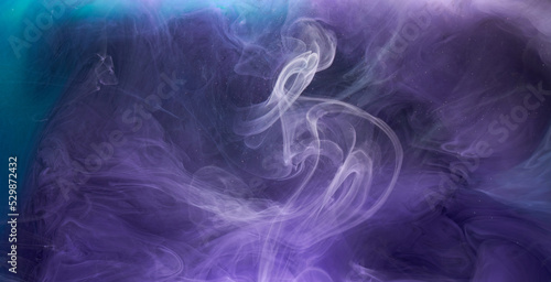 Purple lilac multicolored smoke abstract background, acrylic paint underwater explosion