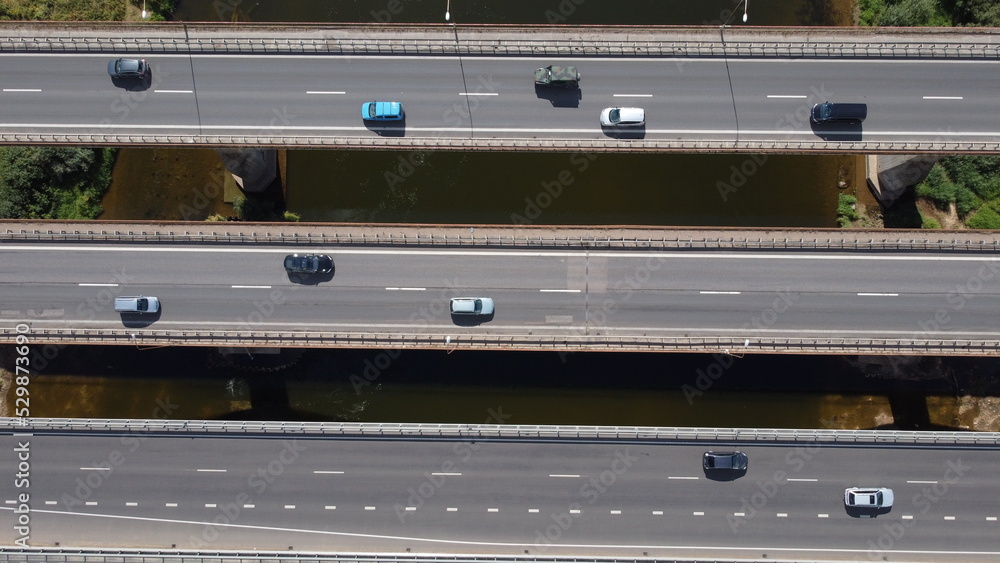 Three line bridge above Nerius river, Kaunas, Lithuania, Central Europe. Cars, trucks, differnt angel of view on same bridge