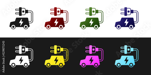 Set Electric car and electrical cable plug charging icon isolated on black and white background. Renewable eco technologies. Vector