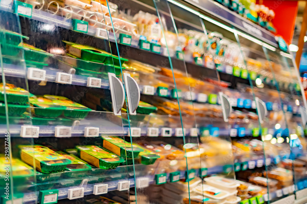 Food products displayed in a commercial refrigerator