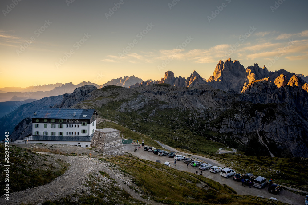 Rifugio Auronzo at sunrise Hiking trail to the Drei Zinnen Hütte in the Dolomites in South Tyrol, Italy. Rifugio Auronzo at sunrise Hiking trail to the Drei Zinnen Hütte in the Dolomites in South Tyrol, Italy.