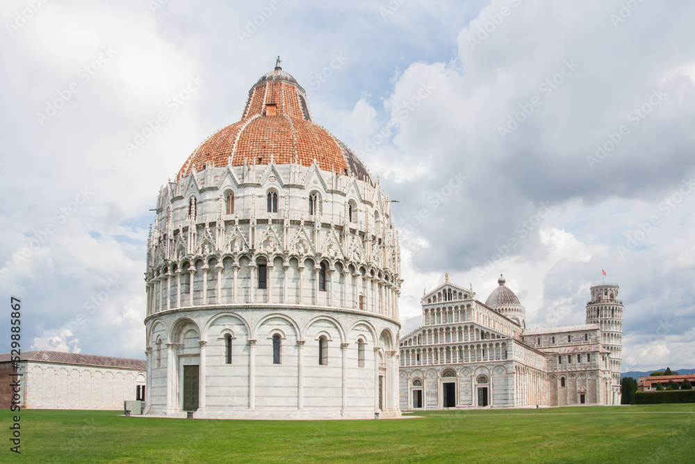 Leaning tower complex in Pisa ith adjacent buildings of Cathedral and  Baptistery in Italy