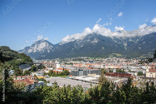 View of the city of Innsbruck, the capital of the 1964 and 1976 Olympic Games from the Bergisel hill tower of the sports complex and the Alps in the background © NK Project