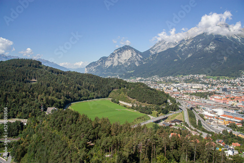 View of the city of Innsbruck  the capital of the 1964 and 1976 Olympic Games from the Bergisel hill tower of the sports complex and the Alps in the background