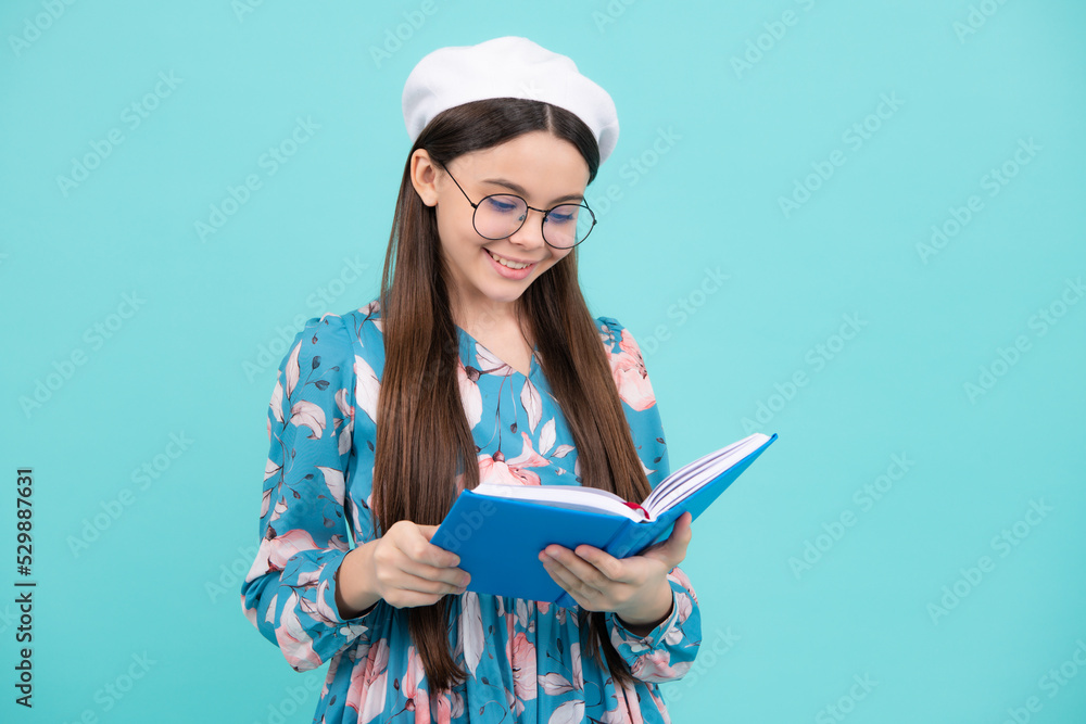 Teen girl pupil hold books, notebooks, isolated on blue background, copy space. Back to school, teenage lifestyle, education and knowledge. Happy teenager, positive and smiling emotions. Teen girl pupil hold books, notebooks, isolated on blue background, copy space. Back to school, teenage lifestyle, education and knowledge. Happy teenager, positive and smiling emotions.