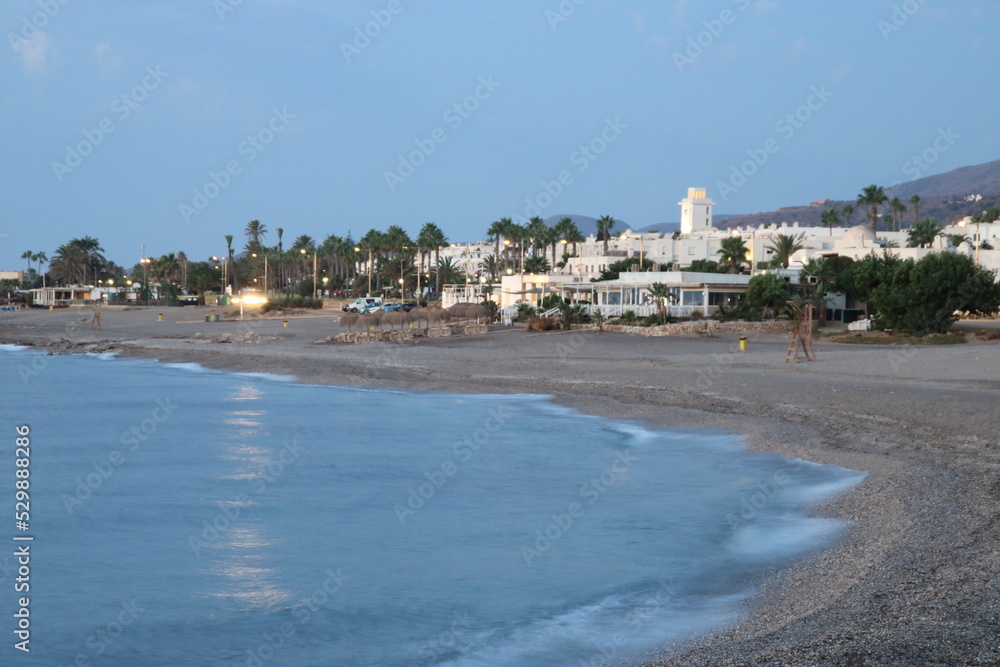 Landscape on the beach with blue sky and sea and white building background at Mojacar, Almeria. Spain 