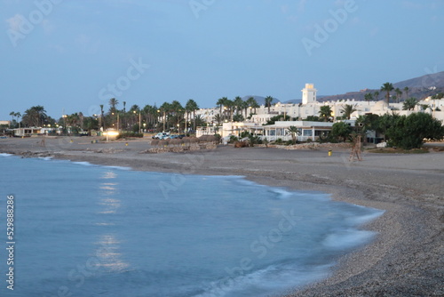Landscape on the beach with blue sky and sea and white building background at Mojacar, Almeria. Spain 
