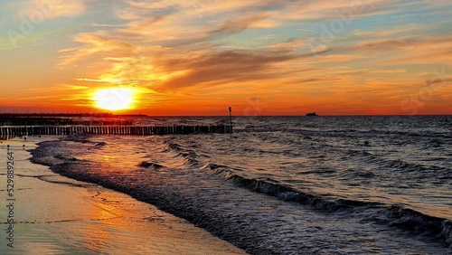 sunset on the beach © GrzegorzUrbaniak