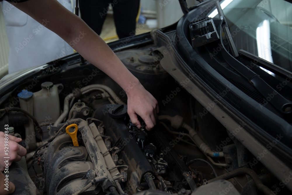 Vehicle diagnostics using a scanner.Car repair.Car engine repair. Vehicle diagnostics using a scanner.Car repair.Car engine repair.