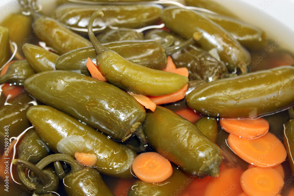 sample of traditional spicy pickled chilies to accompany Mexican food