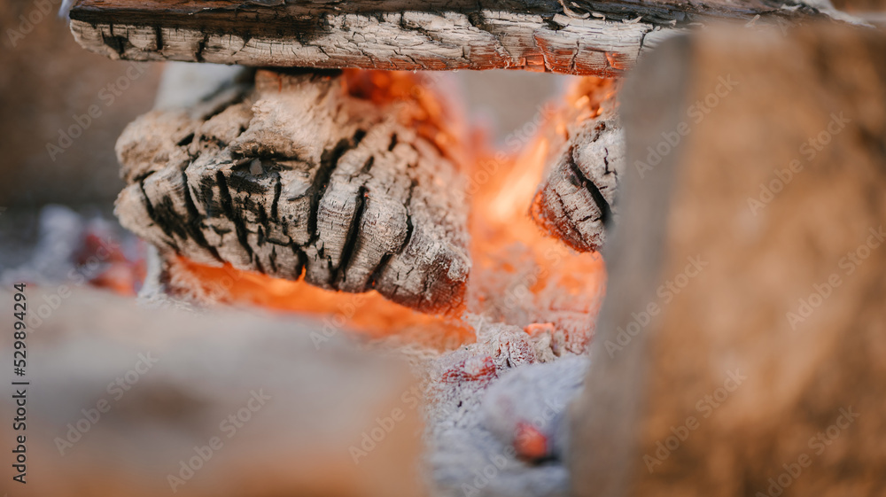 A fire burns in a fireplace, Fire to keep warm. A fire burns in a fireplace, Fire to keep warm.