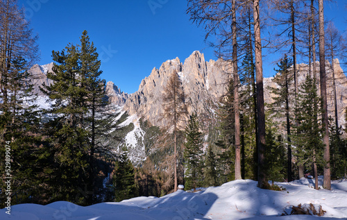 mountains in val di fassa in winter, with snow