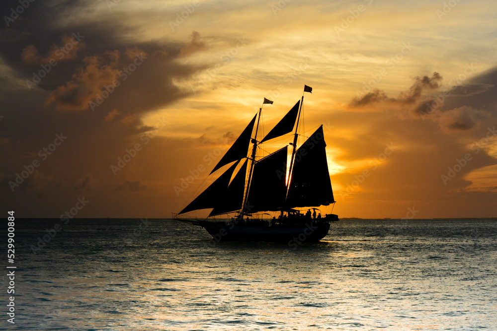 Fototapeta premium Sailboat at sunset