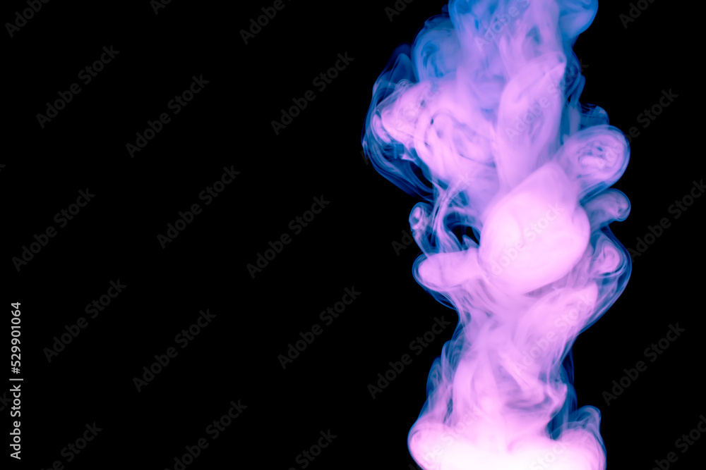 puffs of thick blue red smoke against a black background puffs of thick blue red smoke against a black background