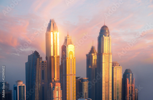 Dubai Marina skyscrapers view at golden sunset. Dubai  UAE.