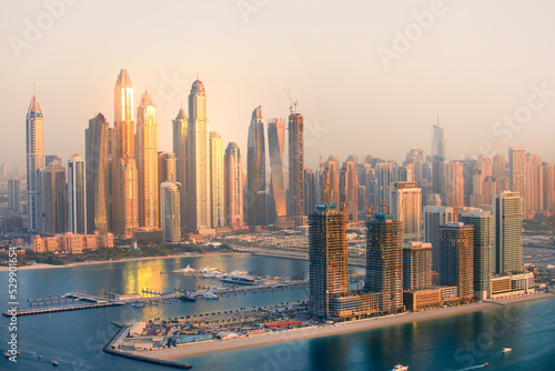 Dubai Marina skyscrapers view at golden sunset. Dubai, UAE. © IRStone