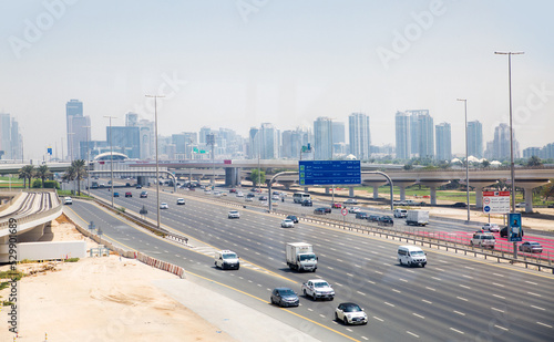 Dubai, UAE.  Sheikh Zayed road, the main road of Dubai view with cars and city centre at the background  © IRStone