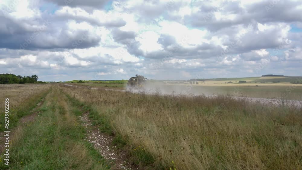 British army Supacat Jackal rapid assault, fire support and reconnaissance vehicle in action on a military exercise British army Supacat Jackal rapid assault, fire support and reconnaissance vehicle in action on a military exercise