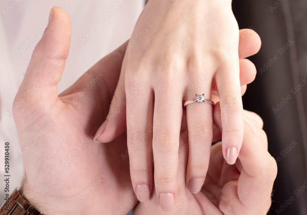 Diamond weding ring on woman hand