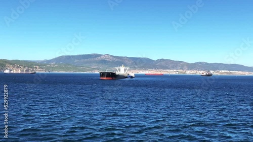 VESSEL DEPARTING ALGECIRAS, SPAIN, It's located in the southern end of the Iberian Peninsula, near the Strait of Gibraltar, it is the largest city on the Bay of Gibraltar (Spanish: Bahía de Algeciras)