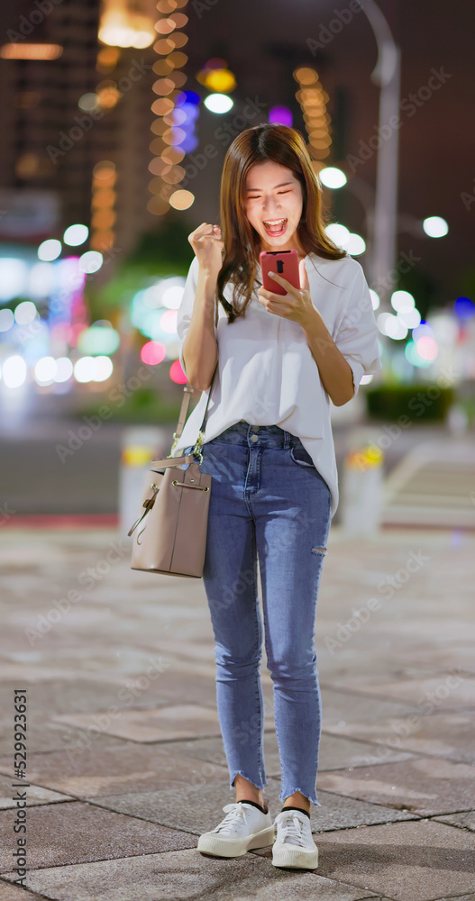 Fototapeta premium businesswoman use phone outdoor