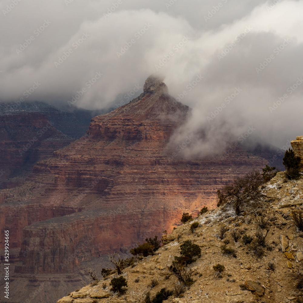 Clouds Wrap Around The Pyramids in Grand Canyon