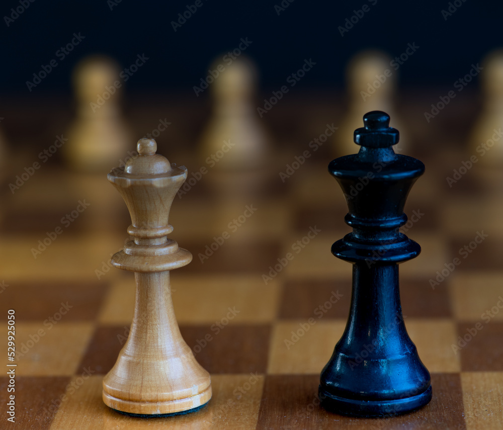 White queen and black king join forces against three pawns White queen and black king join forces against three pawns