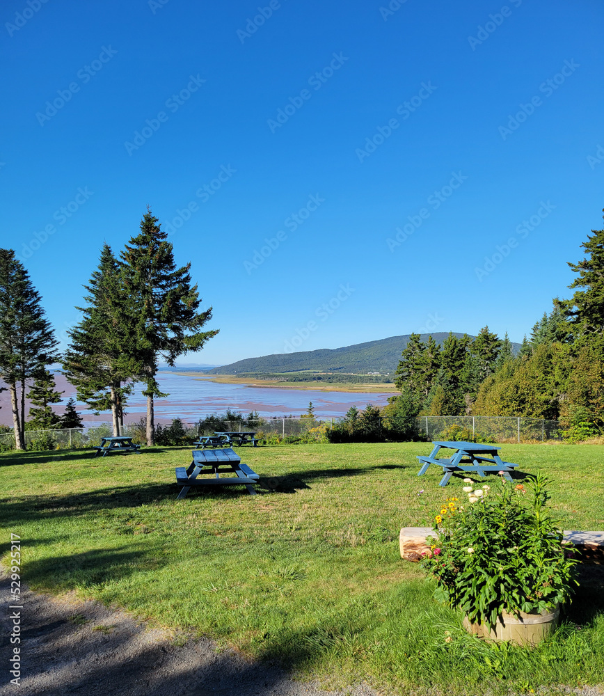 Empty Picnic Table on a Mountain Lake Empty Picnic Table on a Mountain Lake