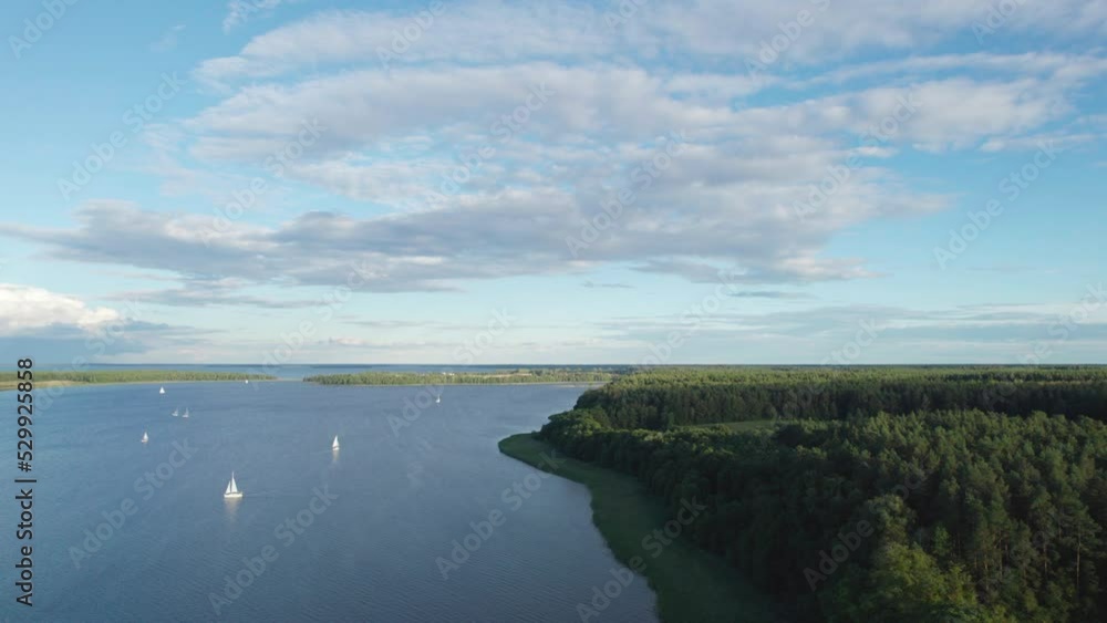 landscape with yachts on the beautiful lake on a summer day (aerial shot) landscape with yachts on the beautiful lake on a summer day (aerial shot)