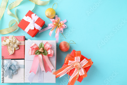 Colorful gift box on light blue color background, Present for giving in special day and holiday © nungning20