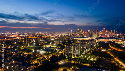 establishing aerial drone night time view of the Chicago skyline metropolis. the cityscape has beautiful architecture that tourist can sightsee. © ezellhphotography