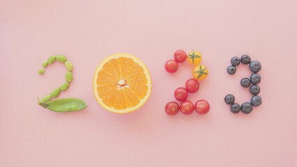 2023 made from healthy food, New year health resolution, diet goal plan and lifestyle wellness concept
