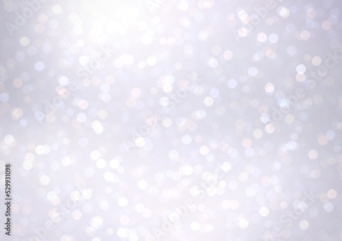 Swirl bokeh sparkles motion on white glow translucent glass background for winter holiday decor. Brilliance snow effect.