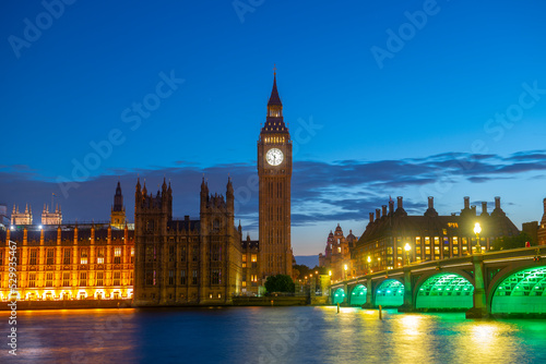 Big Ben  Palace of Westminster and Westminster Bridge at sunset blue hour at night in London  England  UK. Big Ben and Palace is World Heritage Site since 1970. 