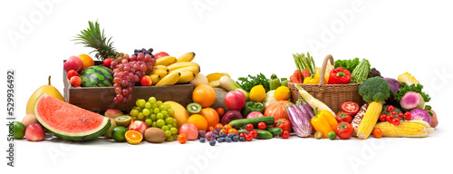 wide photo of different fresh fruits and vegetables isolated on white background.