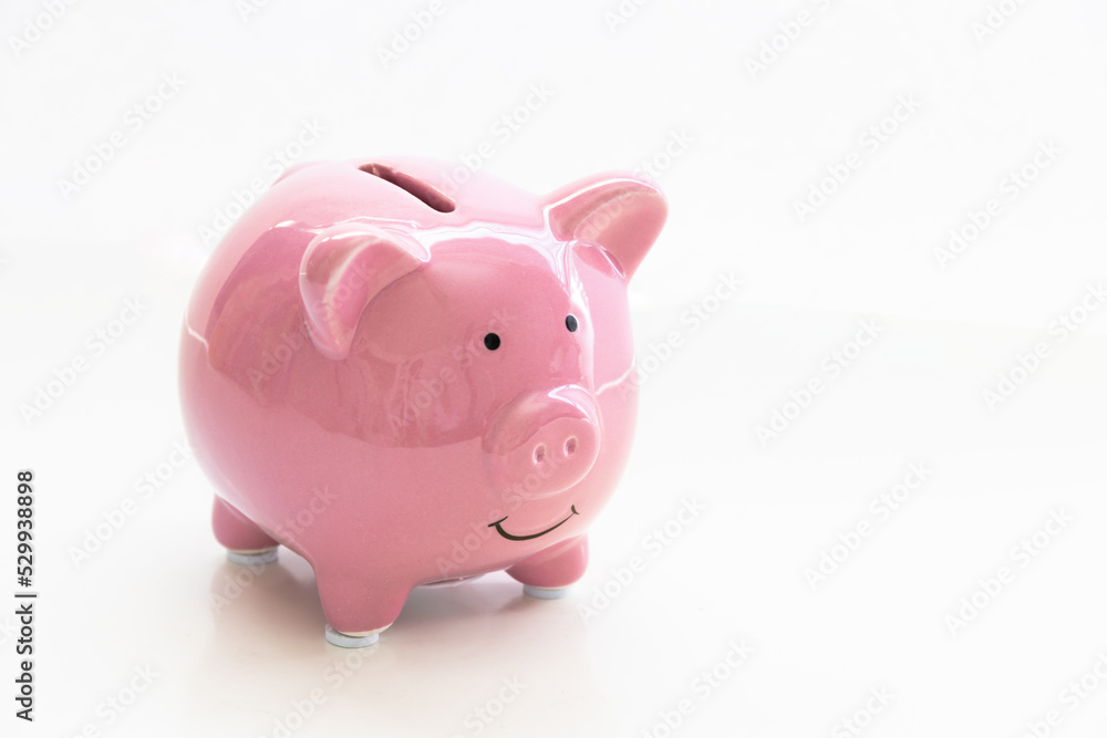 A close up to a isolated piggy bank on a white background.
